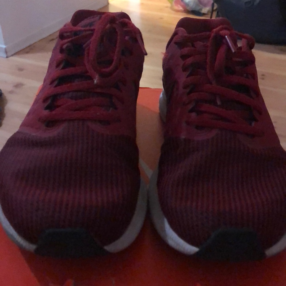 Nike Men running shoes red black and white sole.